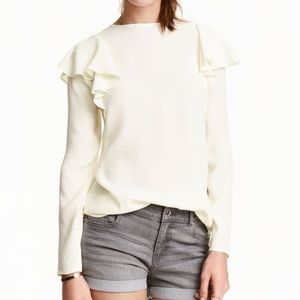Cream crepe blouse with frill shoulders